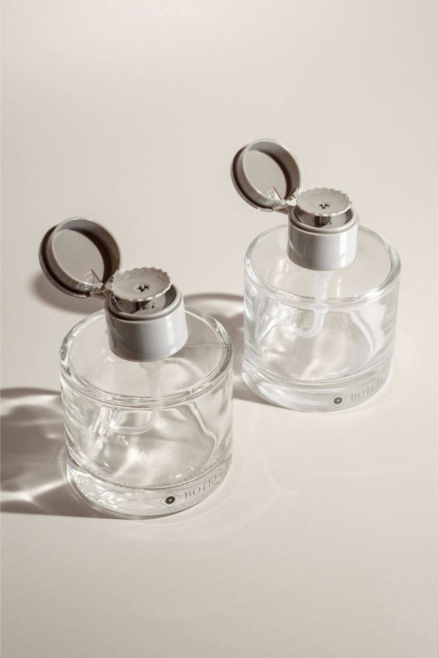 Round Glass Pump Bottle - Duo